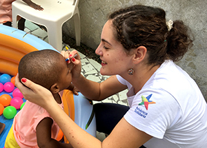 una-experiencia-como-voluntaria-en-america-solidaria-haití-natalia-montaldo-trabajo-niña-web